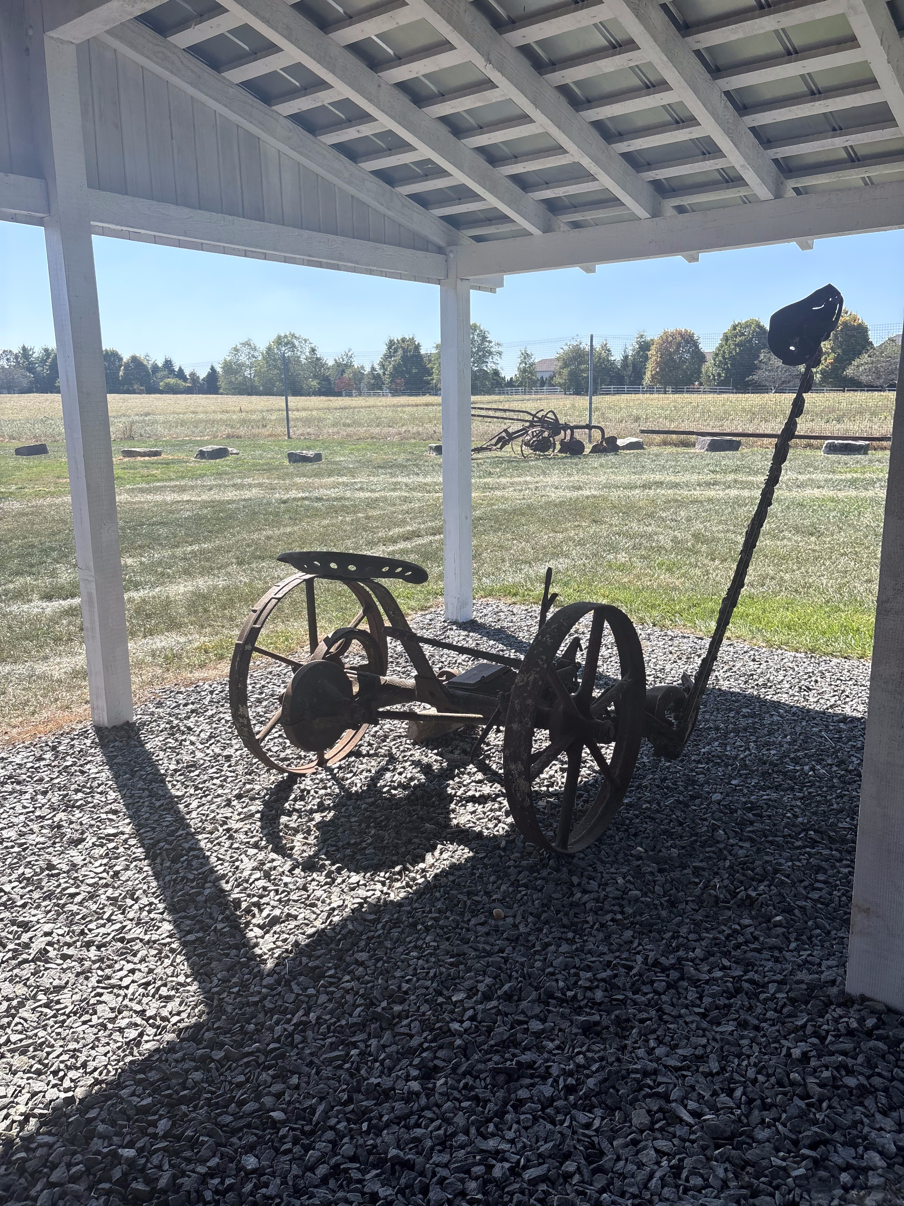 A view of antique farm machinery.